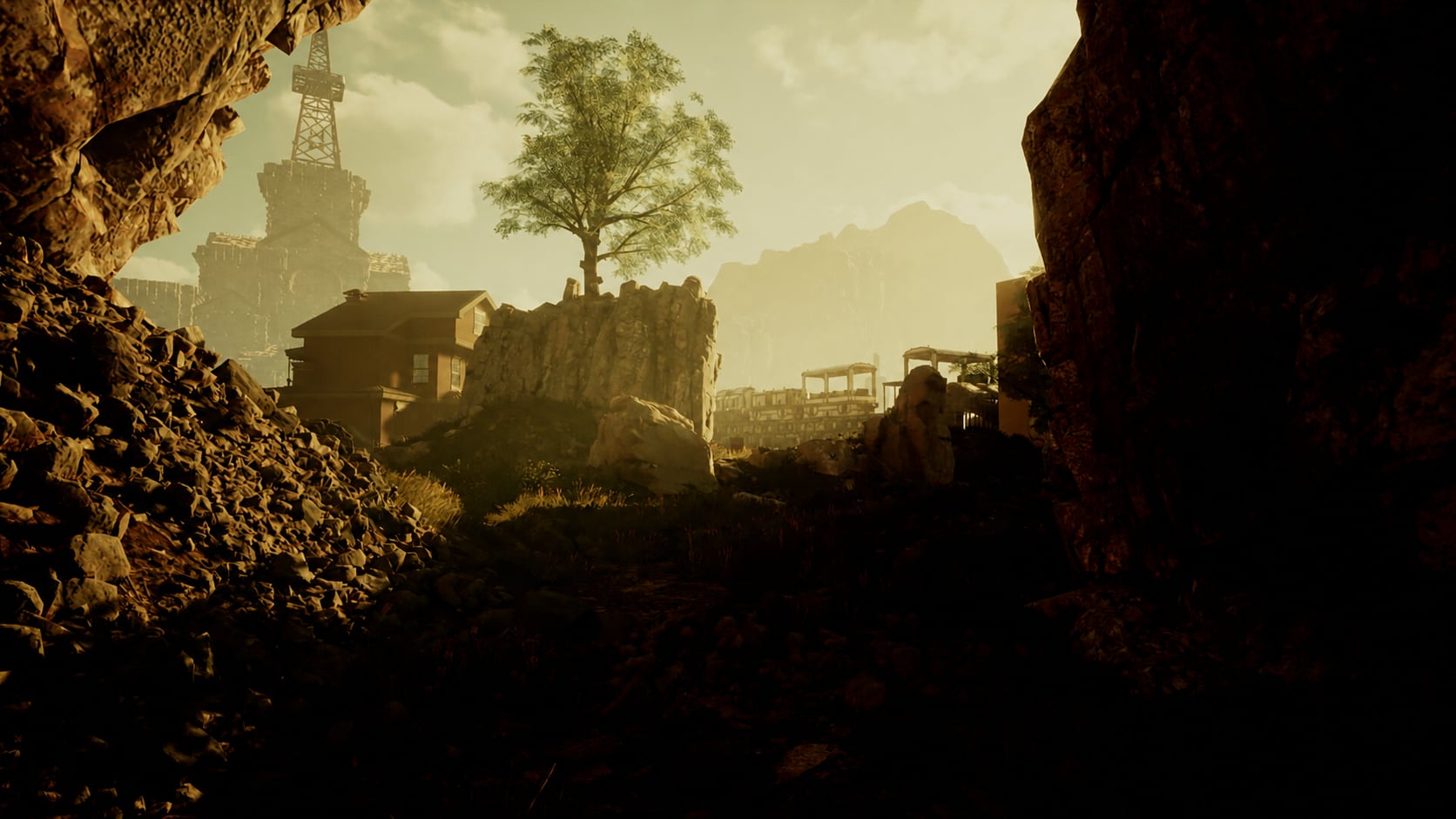 A rocky passage opening toward distant buildings and elevated structures, with a tower and mountain ridge in the background.
